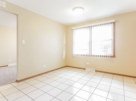4th image of 9413 Menard Ave