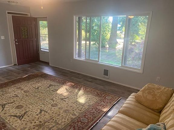 View of front yard from Living Room. Entry closet