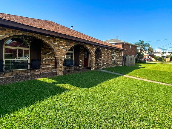 Outside front of house and lawn