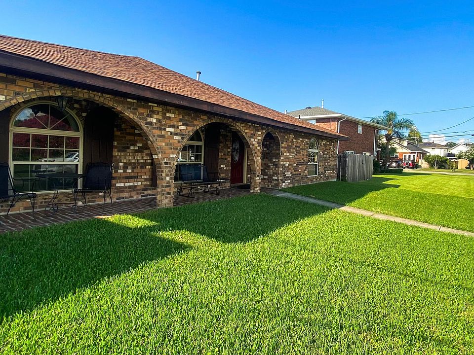 Outside front of house and lawn