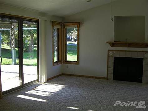 Sliding glass doors lead from the family room to the covered pation.