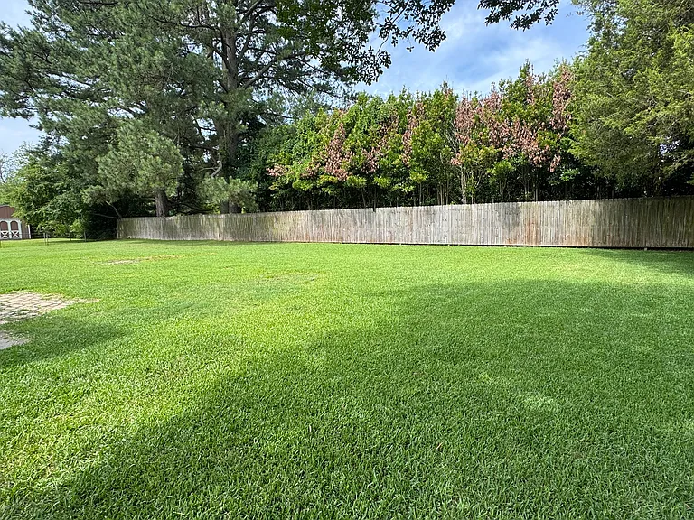 Large fenced back yard.