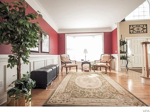 Formal Living Room opens to the Formal Dining Room for easy entertaining