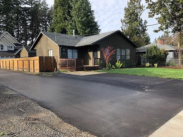 Here is the house with parking spot in front. There is lots of street parking as well.