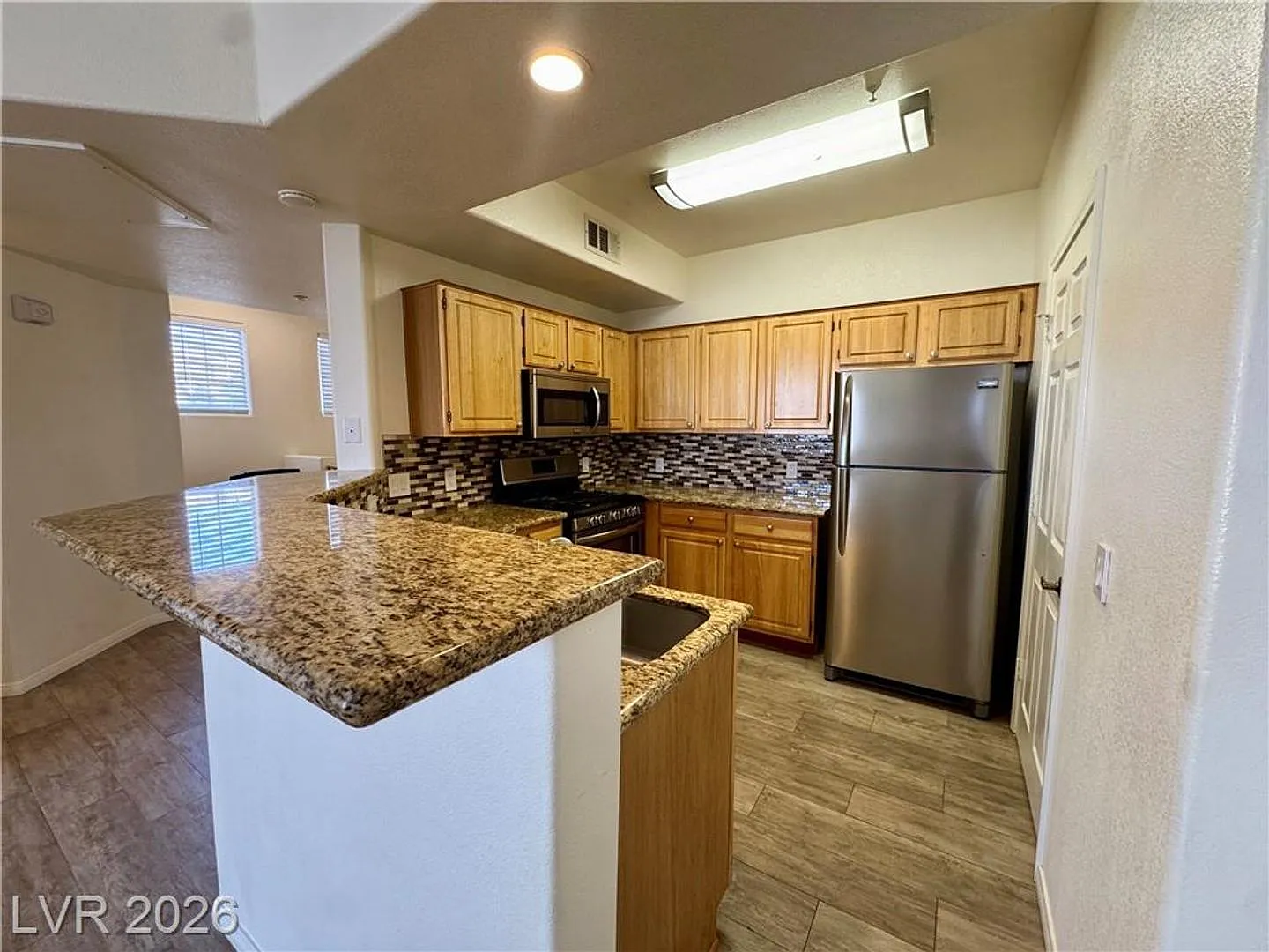 Stylish Condo with Fireplace, Walk-In Closet, & Community Pool — Photo 4