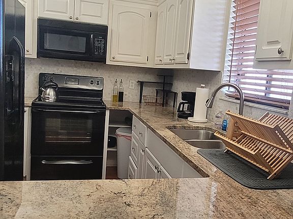 4th image of 12524 Shoreline Dr APT 402
