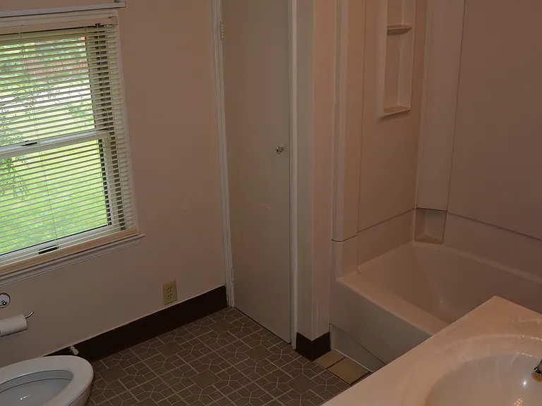 Bathroom - tub/shower, sink with medicine cabinet, toilet and closet