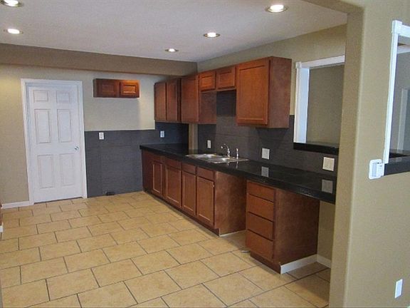 Remodeled kitchen with new cabinets and counter