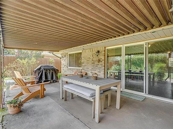 Easy access into the backyard and the comfort of the covered patio.