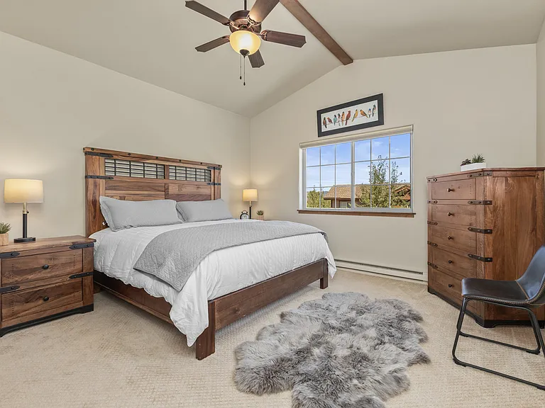 Upper level king bedroom with ceiling fan