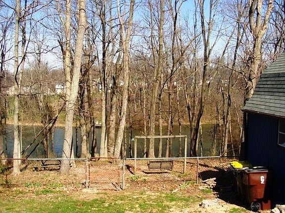 Wooded lake access with your own private dock.