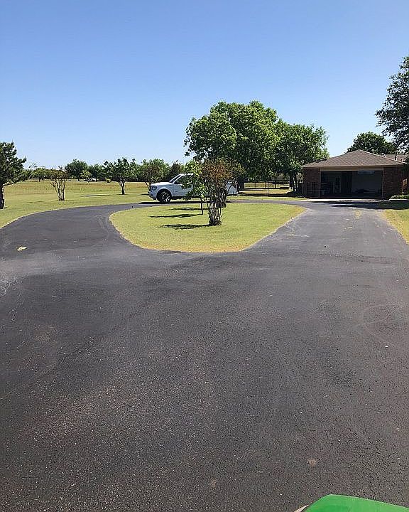 Paved circle driveway