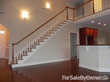 Living room : Living room looking toward kitchen and staircase.