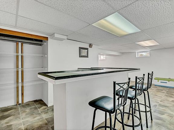 Finished Lower Level with a Built In Bar