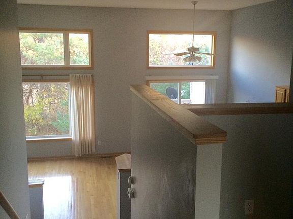 Vaulted living/dining/kitchen area from upstairs landing