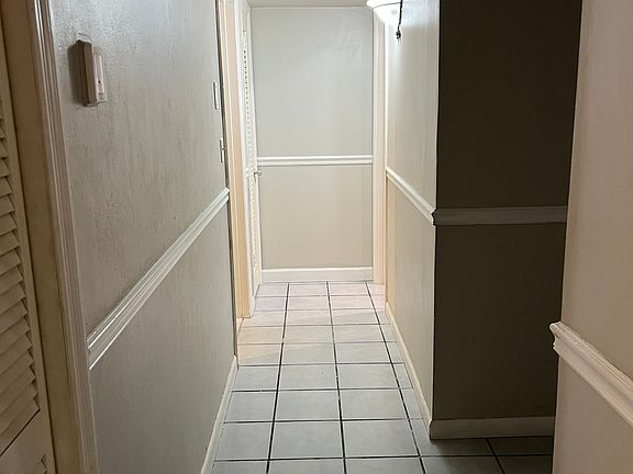 hallway to bedrooms 1 , 2, and bathroom