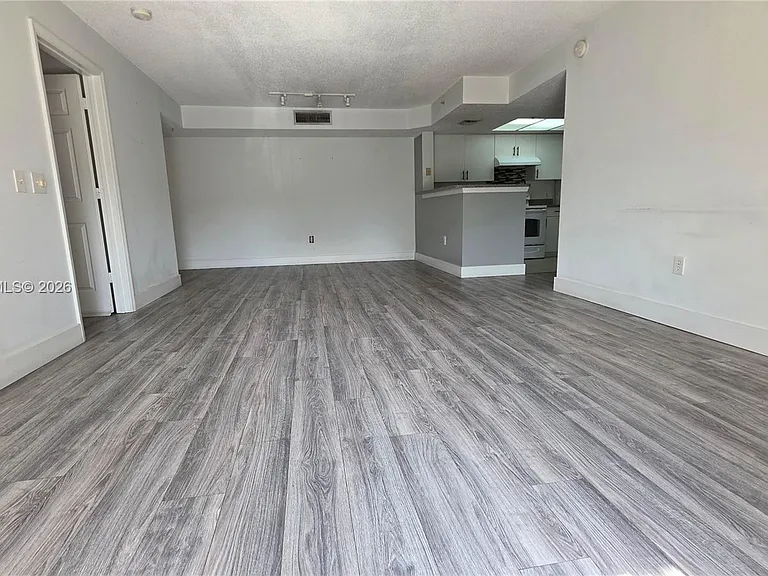 5011 Wiles Rd #203 — Photo 14
