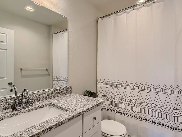 Second bathroom with a tub/shower