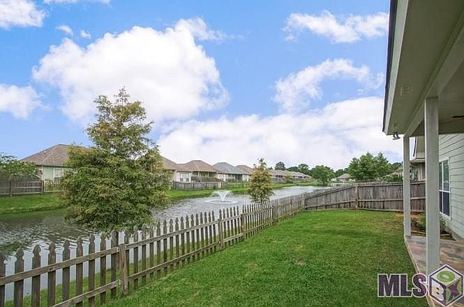 Backyard with view of lake
