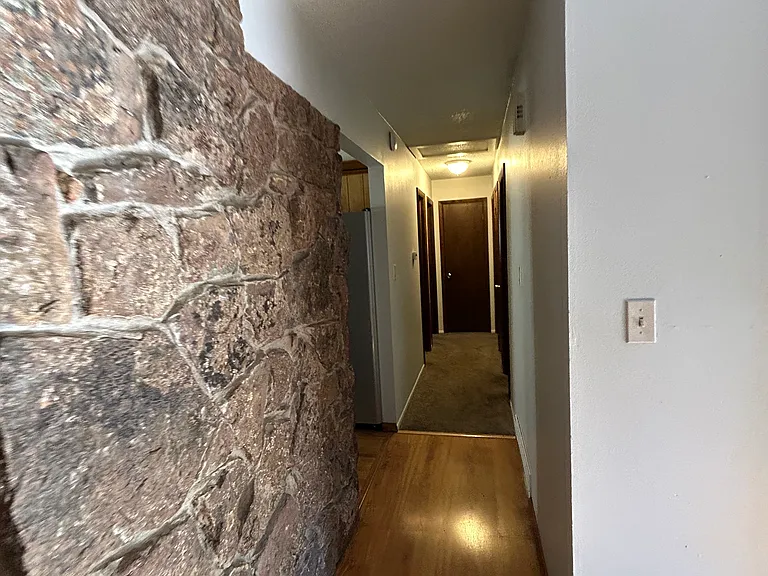 Hall to 3 beds and 1 bath