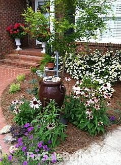 Front of house professionally Landscaped
						:
						Front of house landscaped by Earth Graphics 4 years ago. Beautiful
