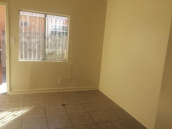 4th image of 8709 1/4 S Hoover St