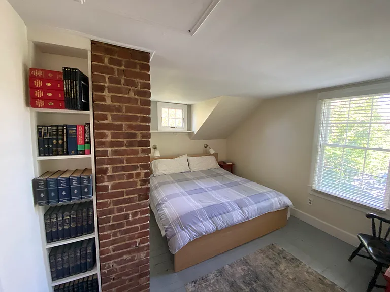 Primary bedroom with King bed and walk-in closet
