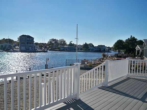 deck to river with 80 ft bulkhead & wave runner lift