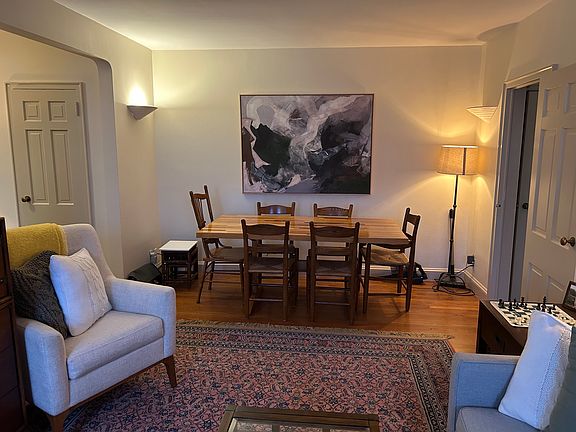 Living room with dining area. Can also be used for a home office setup.