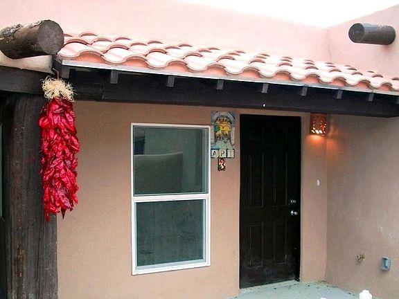 Front Door Entrance with Iron Gate with screen can leave open for those cooler weather days.
