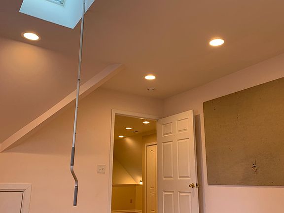 Room 1skylight and blinds control handle, with door into kitchen