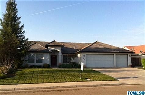 Beautifully landscaped with 3 car garage and wide driveway.
