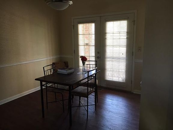 Dining Room Area with French Doors to Balcony