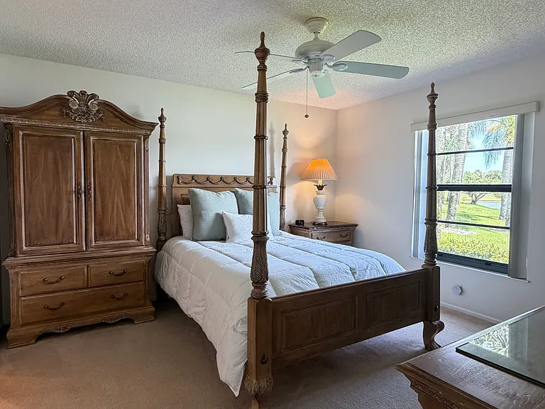 Spacious Primary w/ HUGE walk-in closet + stunning lake & golf course views!