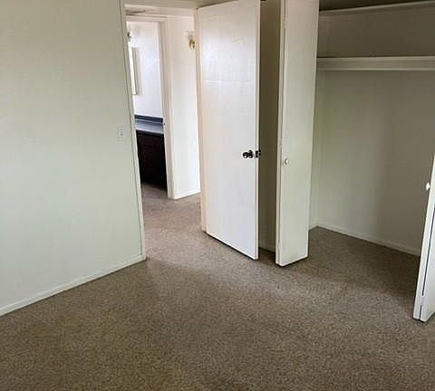 1st bedroom looking toward hallway. Good closet space