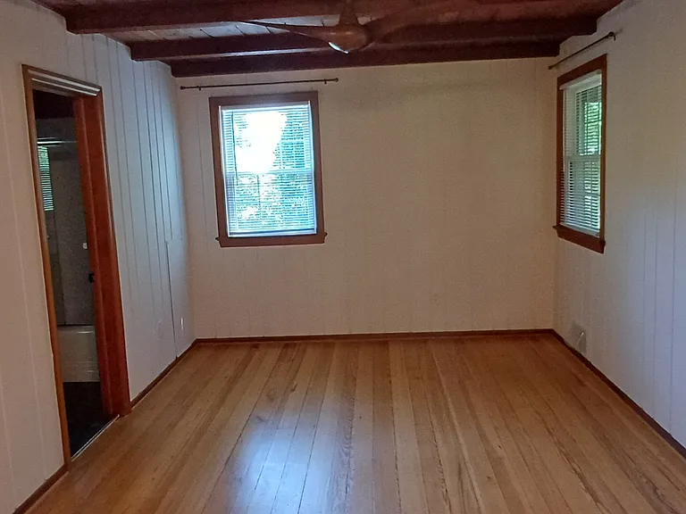 1st floor main bedroom with full bath and 2 closets.