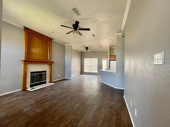Large living room with lots of natural light.