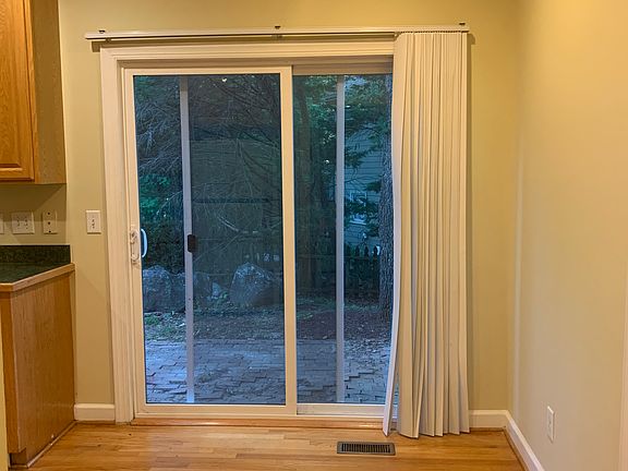 Breakfast room has sliding glass doors to the rear patio.