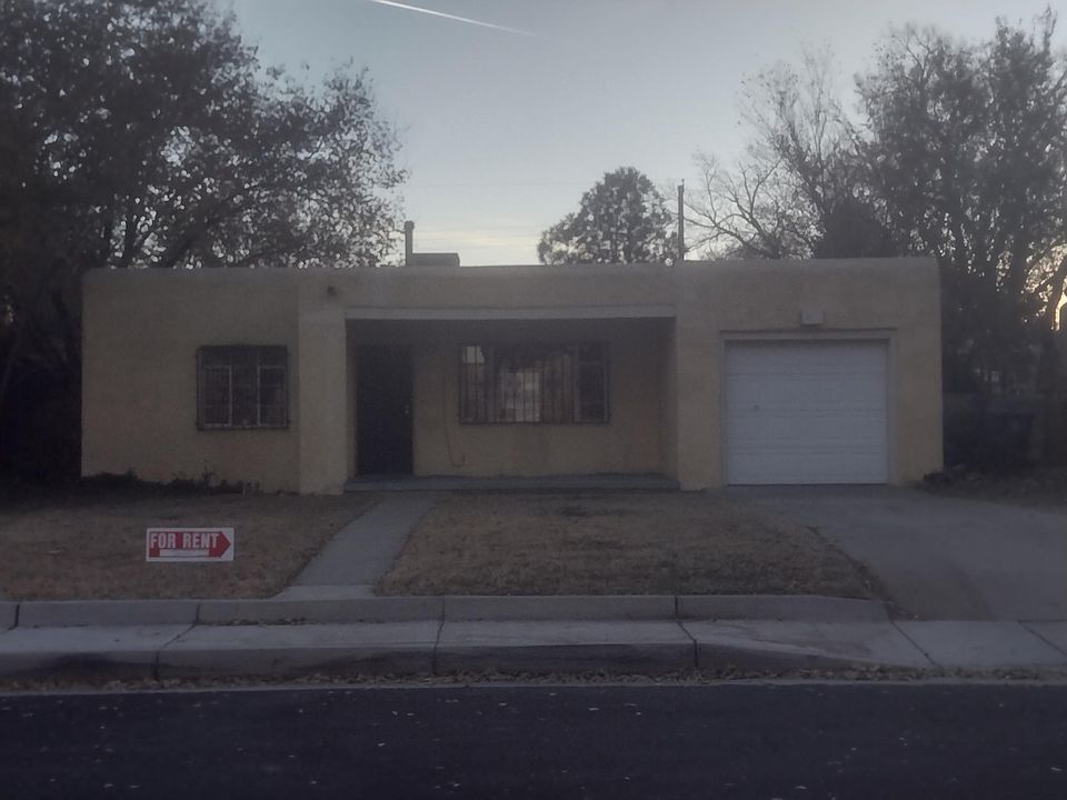 Front of house. Garage and driveway