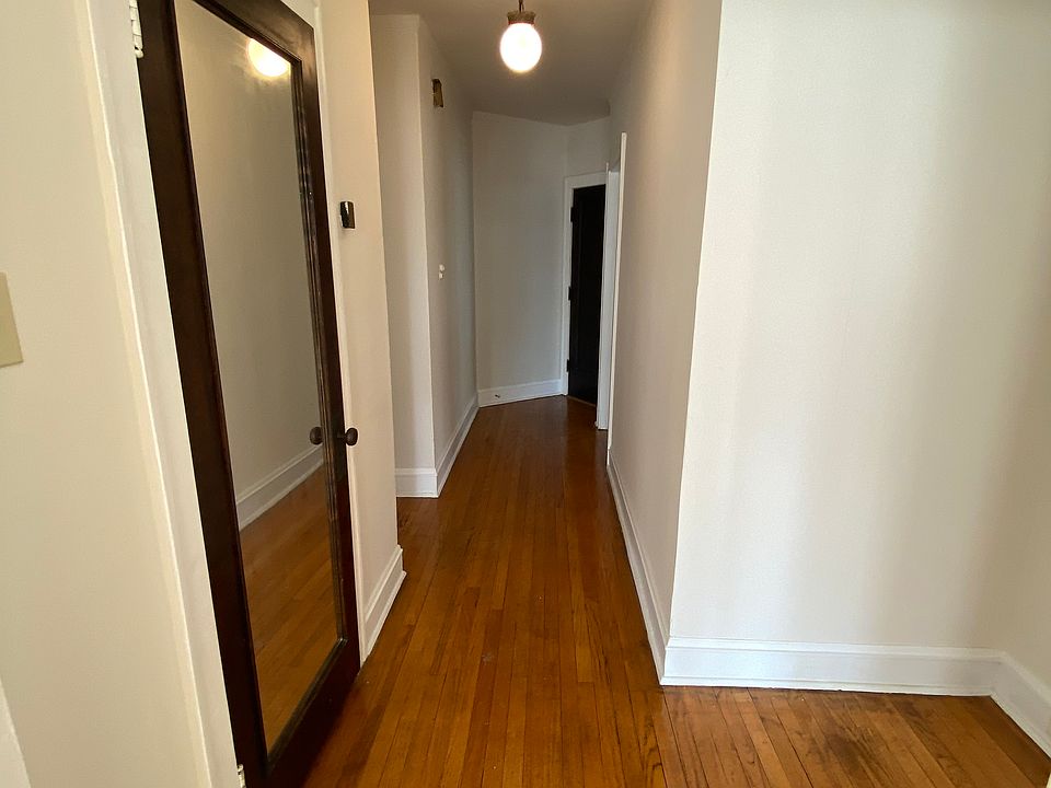Front Door entrance and hallway; built in full length door mirror; vintage lighting