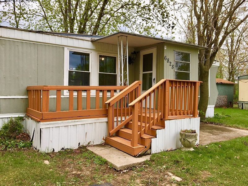 1st image of 6828 E 9th Ave