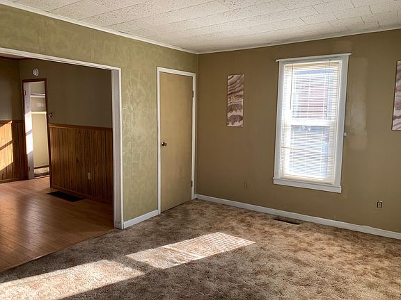 Living room (door goes upstairs)