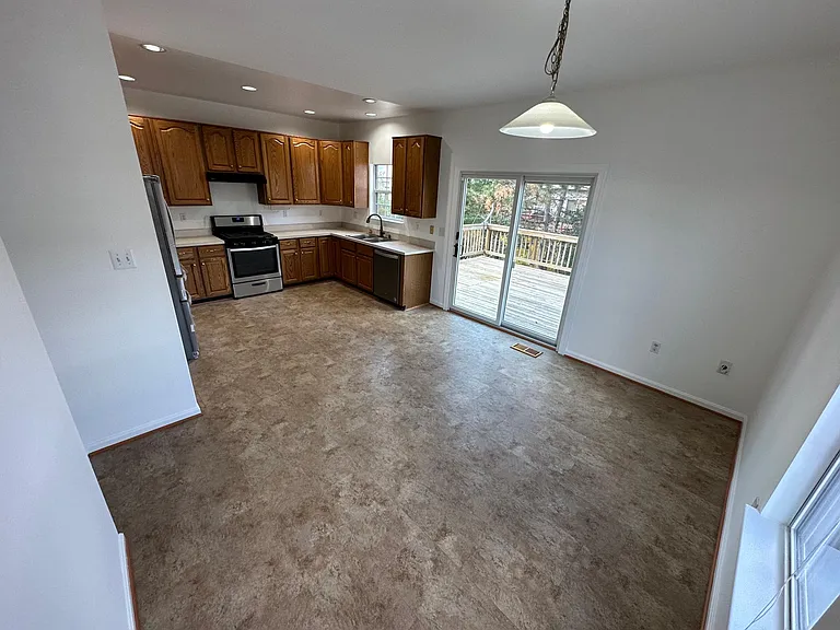 Kitchen looking out to upper deck