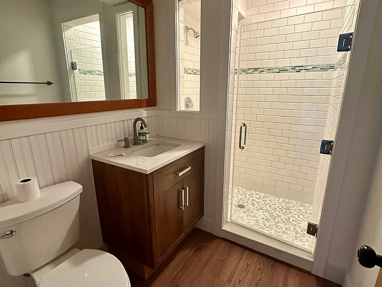 Main bath with glass door walk-in shower