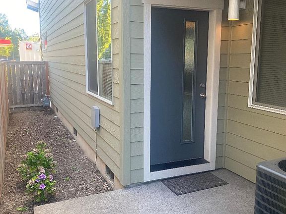 Front door, enclosed side yard