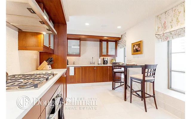 Sold by Douglas Elliman | media 18