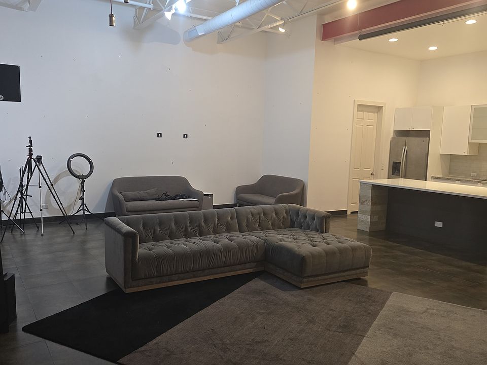 Open living room area to kitchen