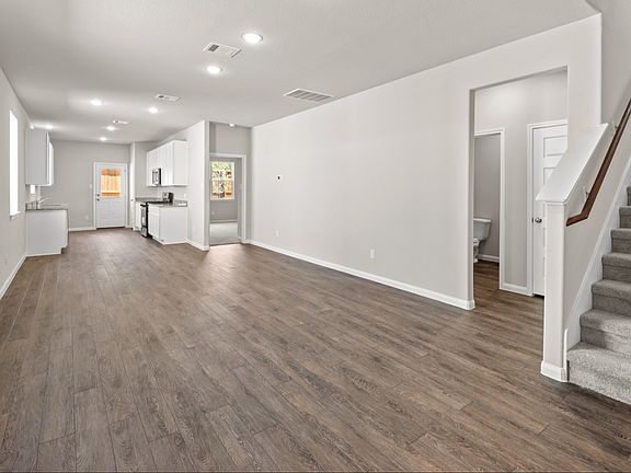 Family Room to Kitchen and Dining Area