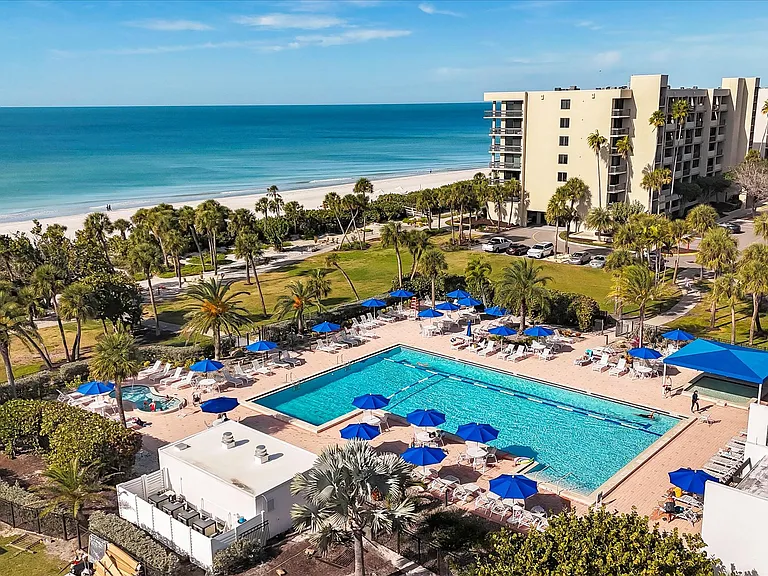 Beachplace expansive swimming pool, hot tub and kiddie pool, pool deck, BBQ grills and picnic space,