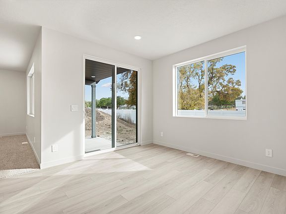 The Weber floorplan interior image taken at a Meritage Homes Community in Grantsville, UT.